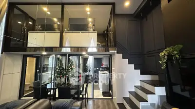 Modern loft apartment with stylish interior and Christmas decor