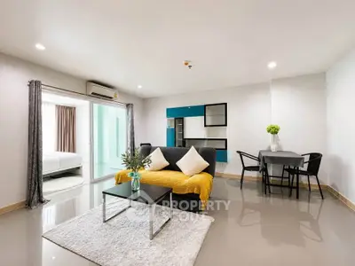 Spacious modern living room with sleek furniture and open layout