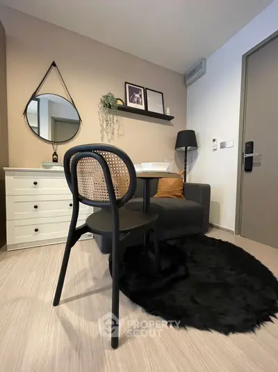 Stylish modern living room with chic decor and cozy seating area.