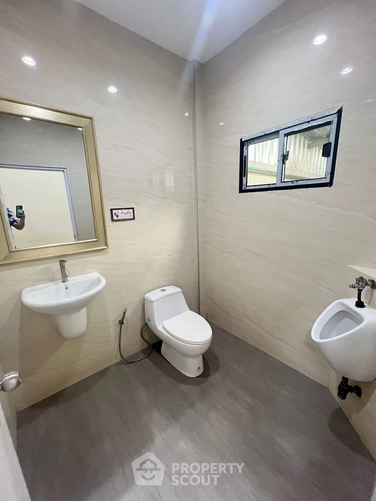 Modern bathroom with sleek fixtures and neutral tones