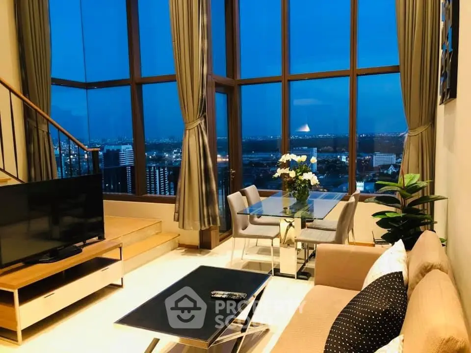 Luxurious living room with stunning city view and elegant decor