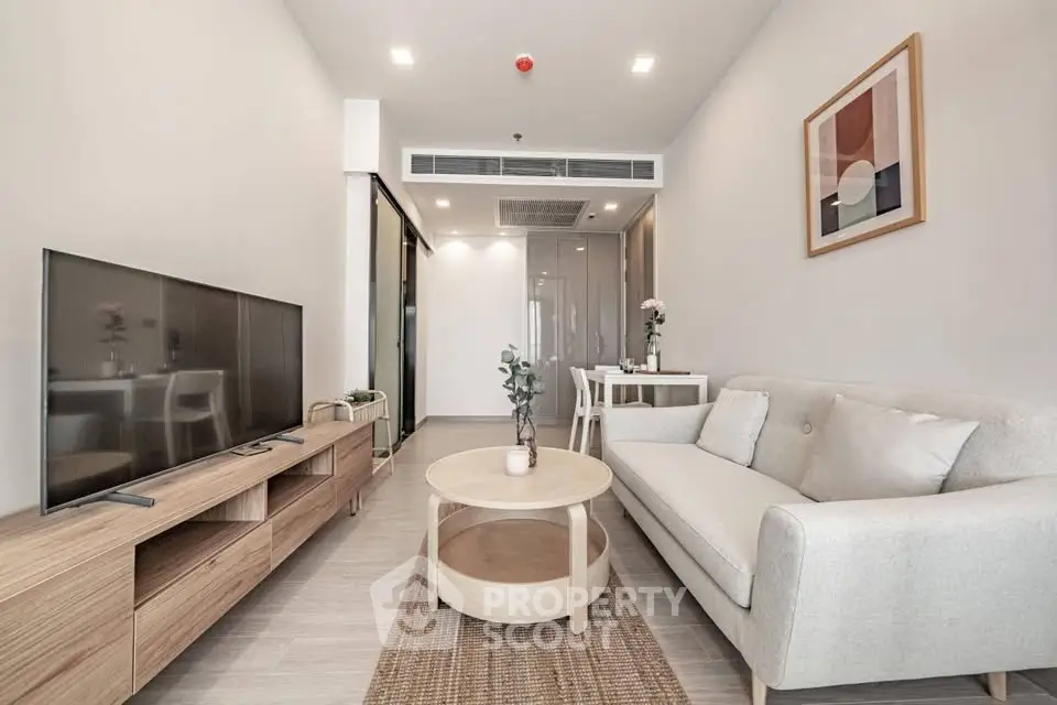 Modern living room with stylish furniture and neutral tones