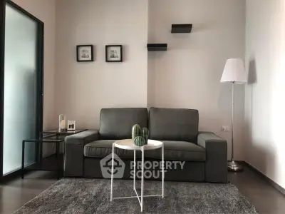 Modern living room with sleek sofa and minimalist decor