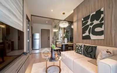 Modern living room with stylish decor and open layout, featuring a cozy sofa and elegant lighting.
