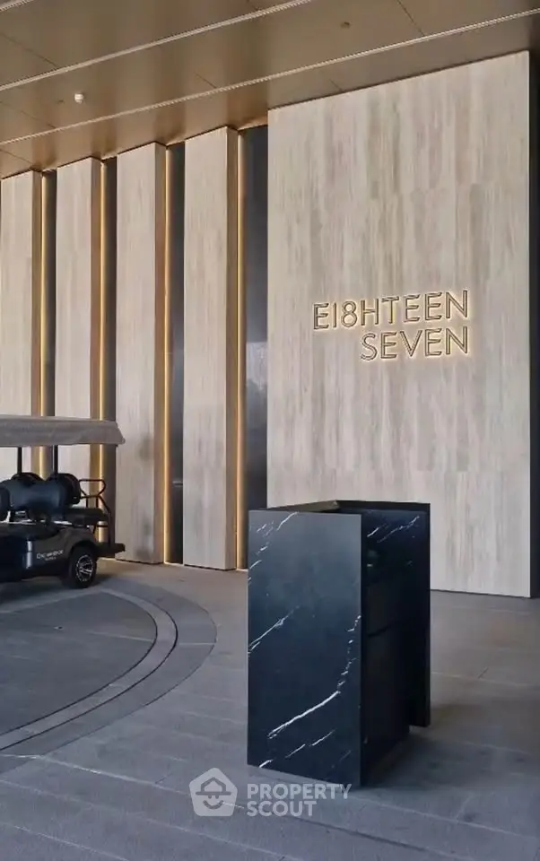 Luxurious building entrance with modern design and elegant lighting