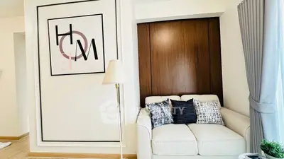 Modern living room with stylish decor and cozy sofa