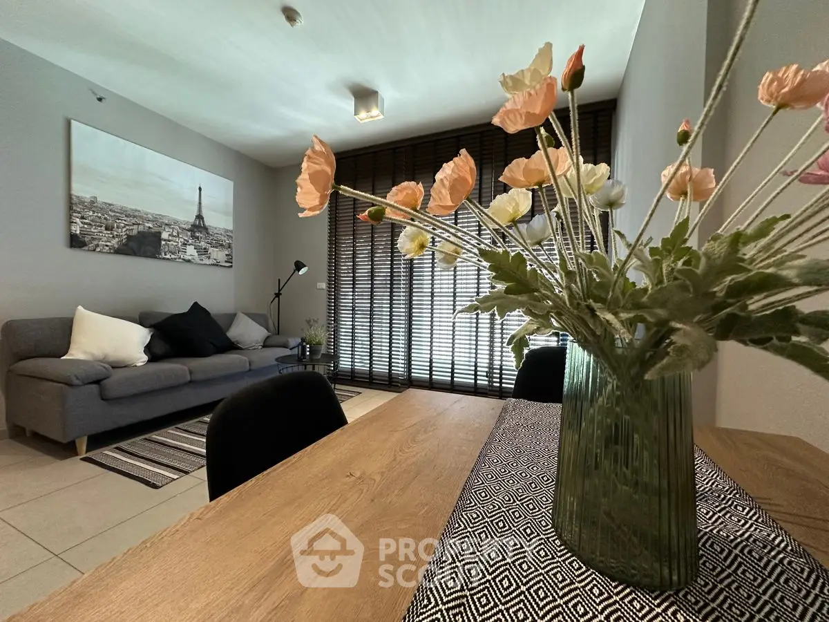 Stylish living room with modern decor and elegant floral centerpiece