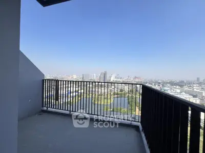 Stunning balcony with panoramic city view in modern high-rise apartment