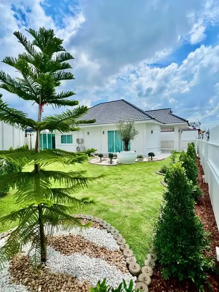 Charming suburban home with lush garden and modern design, perfect for family living.