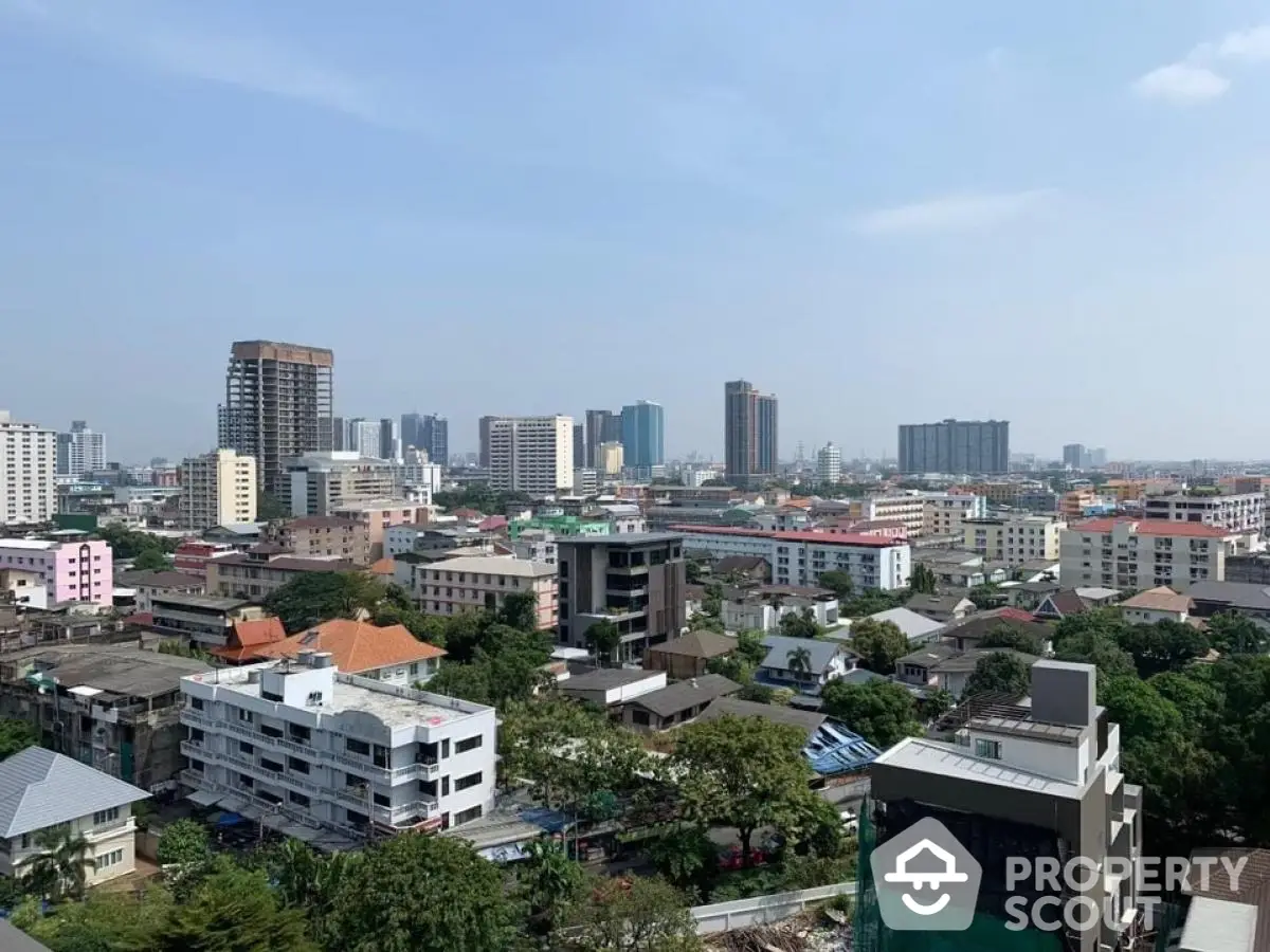 Stunning cityscape view showcasing urban skyline and residential buildings.