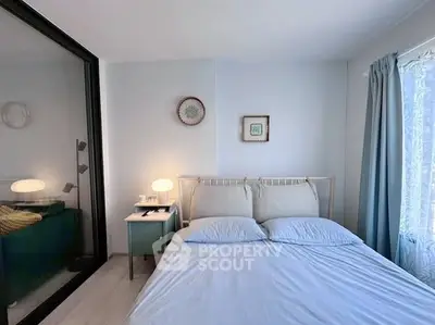 Cozy bedroom with modern decor and natural light