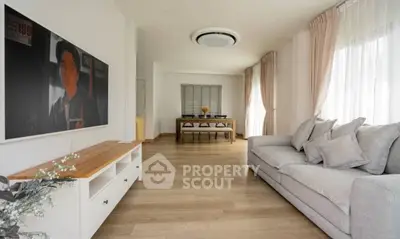 Spacious living room with modern decor and natural light
