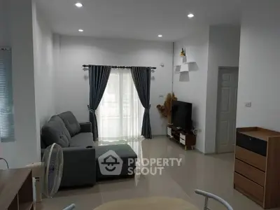 Modern living room with sleek furniture and natural light