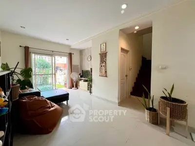 Spacious living room with modern decor and natural light
