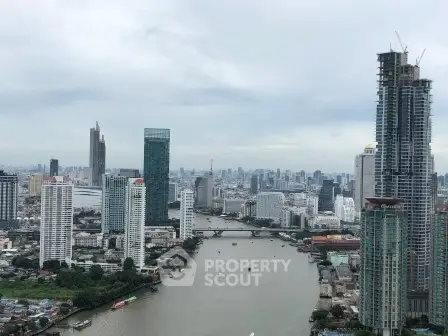 Stunning cityscape view with river and skyscrapers, showcasing urban living at its finest.