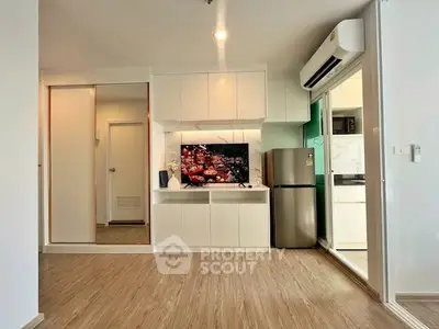 Modern apartment interior with sleek kitchen and stylish living area