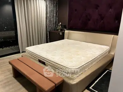 Luxurious bedroom with modern decor and city view