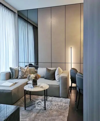 Modern living room with elegant decor and cozy seating area