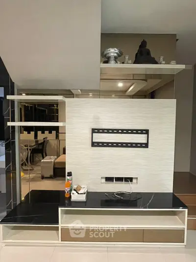Modern living room with sleek TV mount and stylish decor