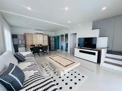 Spacious modern living room with stylish decor and open layout