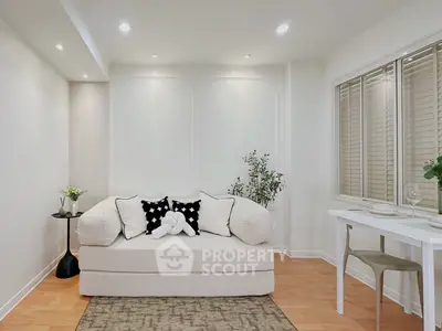 Chic modern living room with cozy sofa and elegant decor