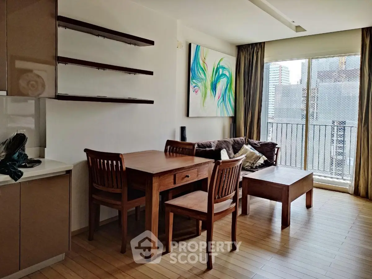 Modern living room with wooden furniture and balcony view in urban apartment