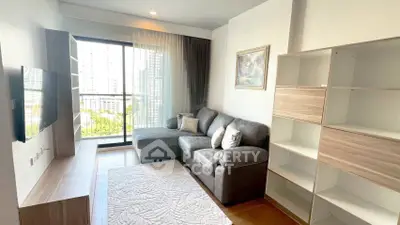 Modern living room with cozy sofa and balcony view in a stylish apartment