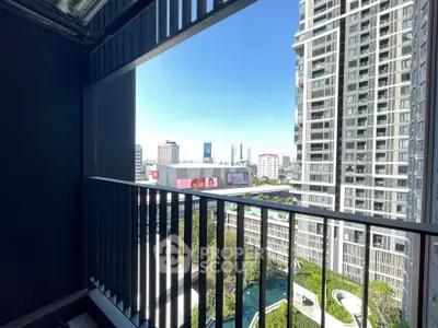 Stunning city view from modern high-rise balcony, perfect for urban living.