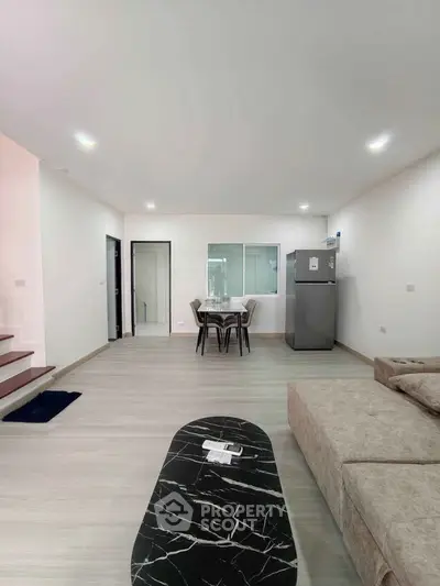 Spacious modern living room with open layout and stylish furniture