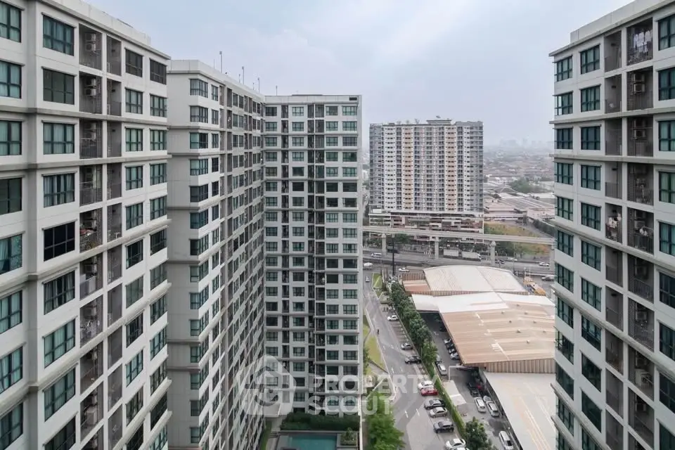 High-rise residential buildings with cityscape view, showcasing urban living and modern architecture.