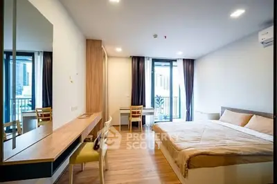 Modern bedroom with balcony in urban apartment