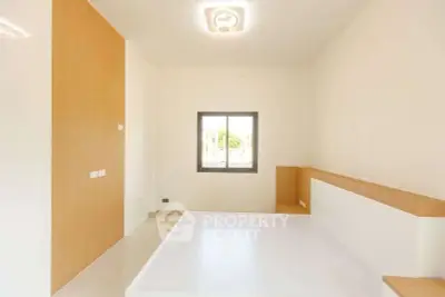 Minimalist bedroom with modern design and natural light