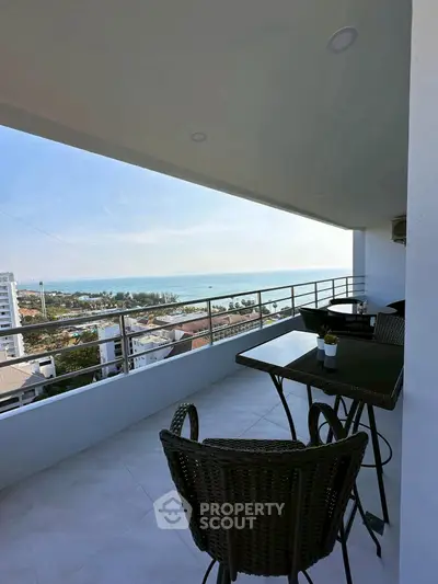 Stunning balcony with ocean view, perfect for relaxation and entertaining.