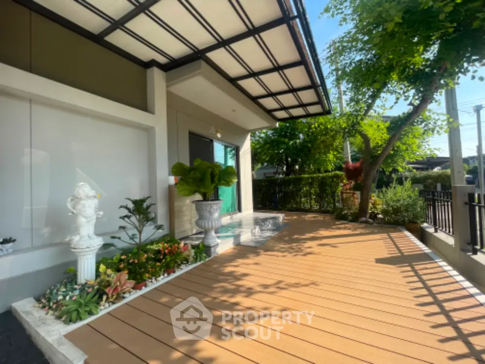 Charming garden patio with elegant decor and lush greenery