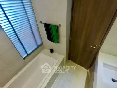 Modern bathroom with bathtub and sleek design