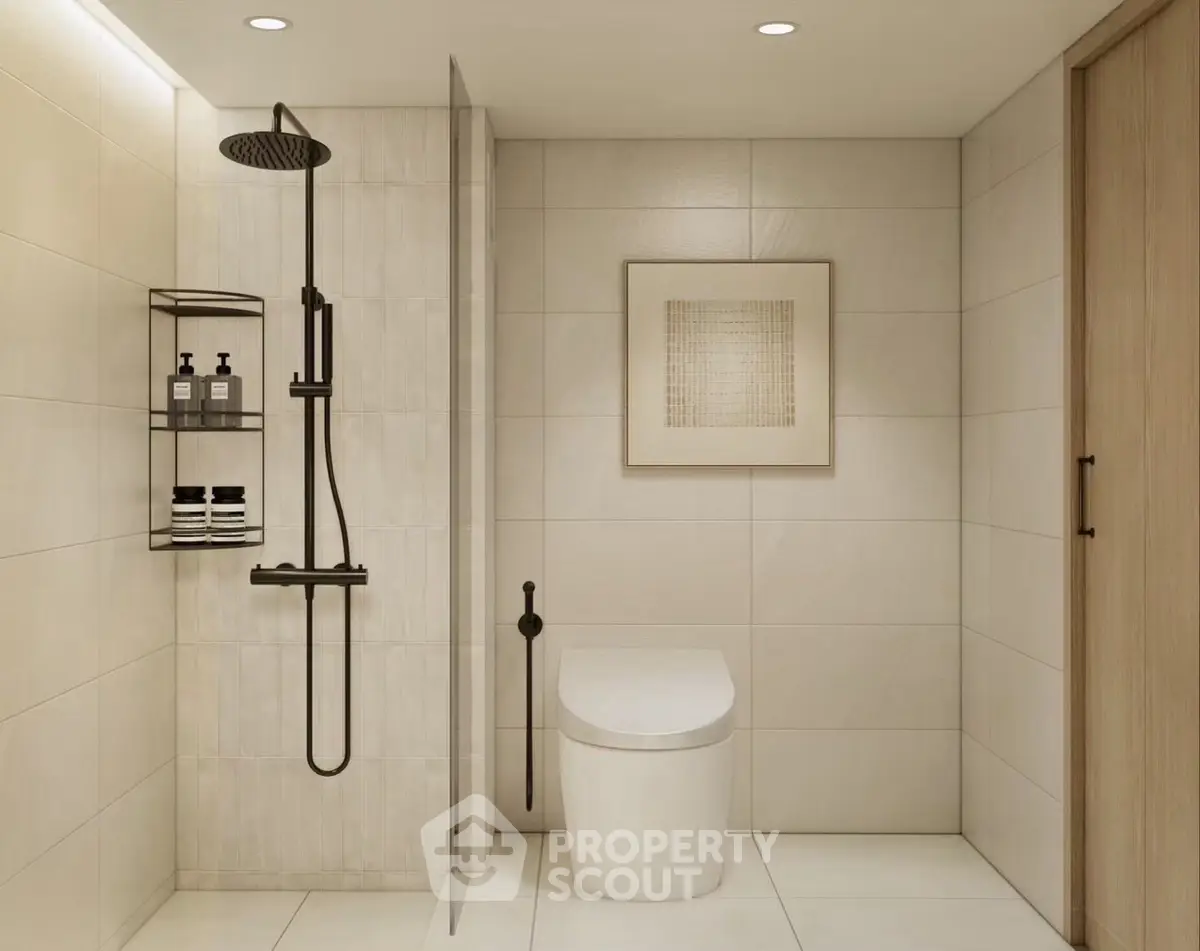 Modern bathroom with sleek shower and elegant tile design.