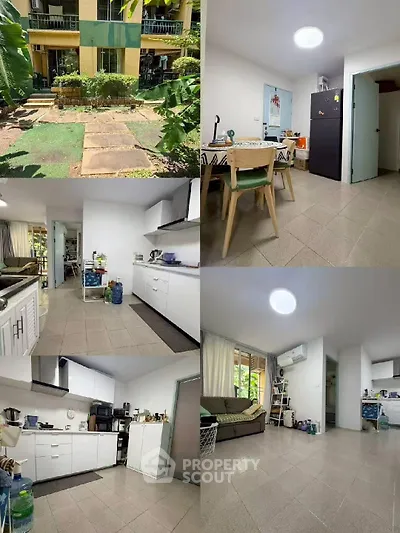 Charming apartment with modern kitchen, cozy living room, and lush garden view.