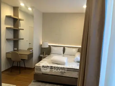 Modern bedroom with stylish decor and cozy ambiance, featuring a comfortable bed and sleek furniture.