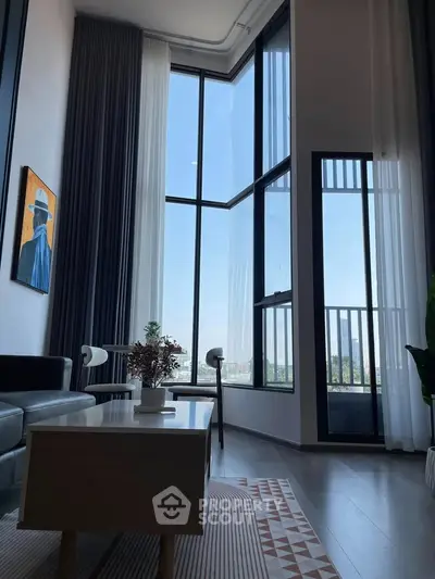 Stunning modern living room with floor-to-ceiling windows and stylish decor