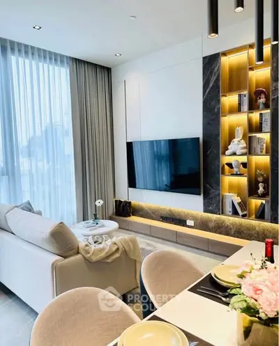 Modern living room with elegant decor and built-in shelving