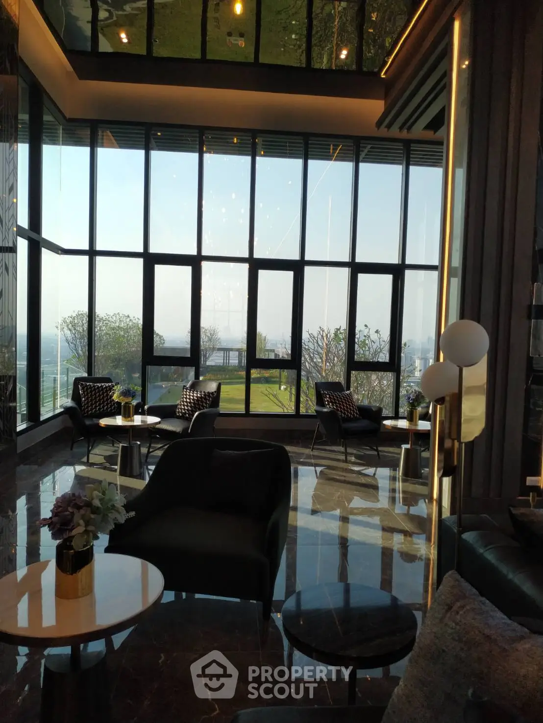 Luxurious living room with floor-to-ceiling windows and stunning view