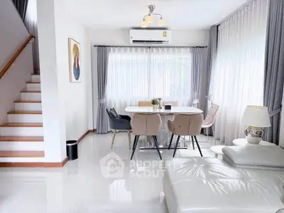 Bright and modern living room with elegant dining area and stylish decor