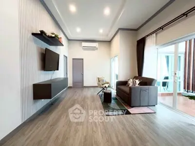 Spacious modern living room with sleek design and natural light