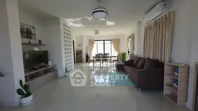 Spacious modern living room with elegant decor and natural light