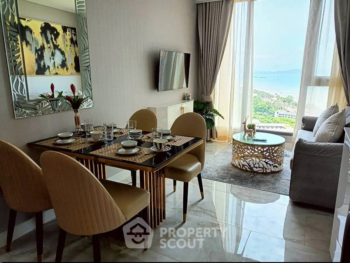 Luxurious living room with stunning ocean view and elegant dining area