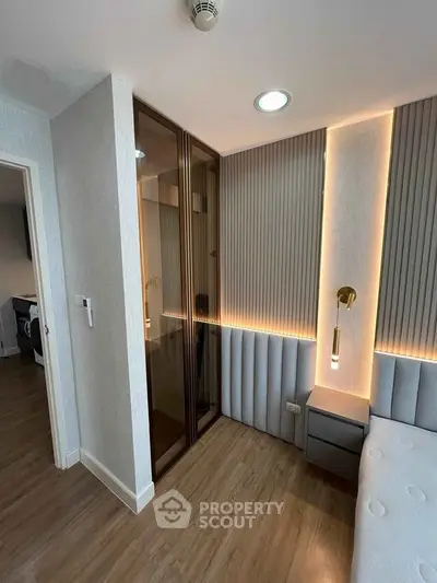 Modern bedroom with elegant lighting and sleek design