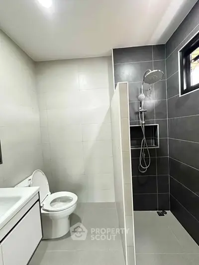 Modern bathroom with sleek design and rainfall showerhead