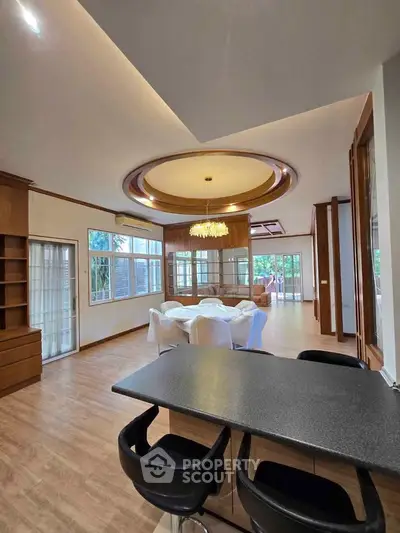 Spacious modern living room with elegant lighting and open layout