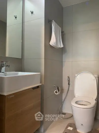 Modern bathroom with sleek fixtures and neutral tones