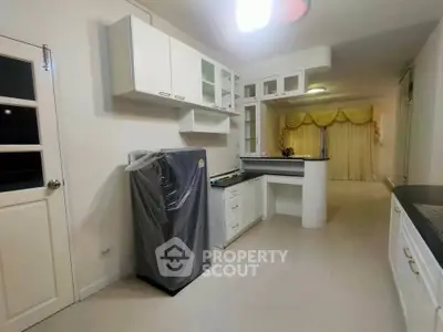 Spacious kitchen with modern appliances and open layout design